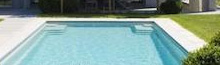 Piscine double escalier droit d'angle